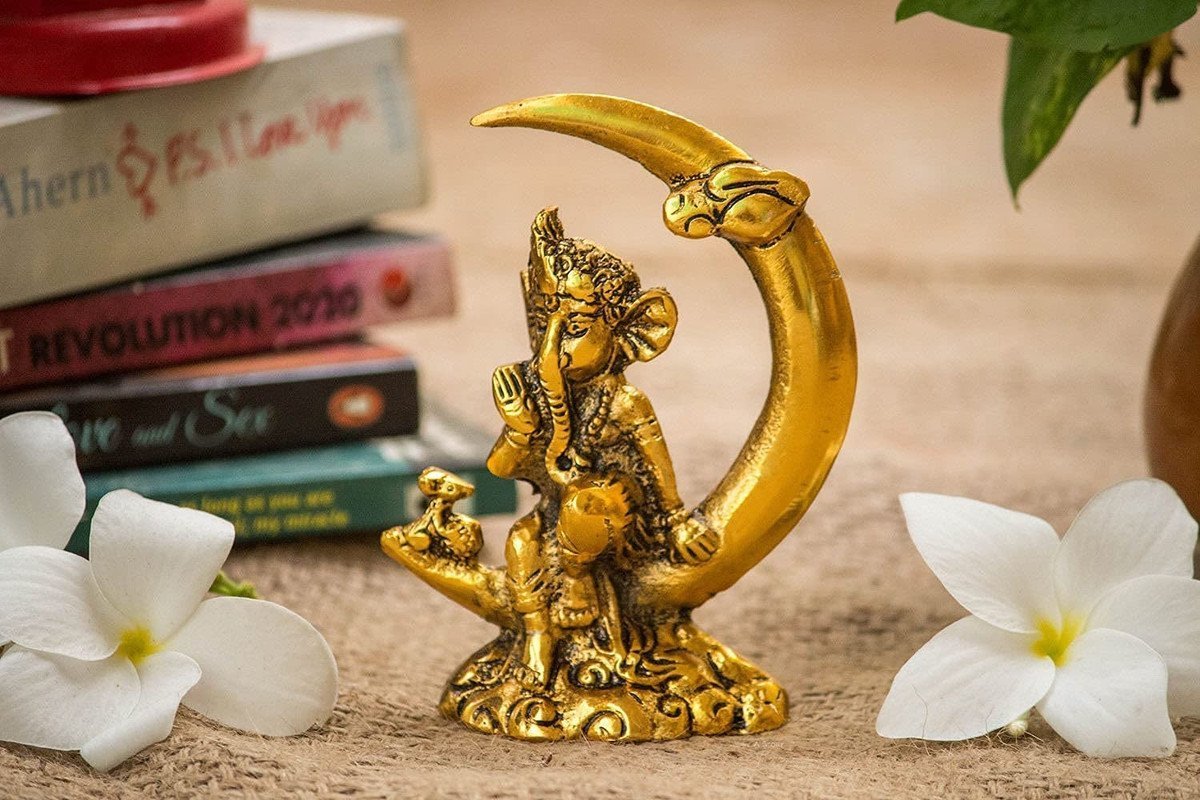 Golden Ganesha Statue on Crescent Moon - Hindu Deity Figurine for Spiritual Peace Golden Ganesha Statue on Crescent Moon - Hindu Deity Figurine for Spiritual Peace